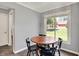 Sunlit dining area offers views of the lush backyard at 601 Shady Ln, Greenwood, IN 46142
