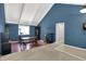 Open-concept living and dining area with a dining table and vaulted ceilings at 601 Shady Ln, Greenwood, IN 46142