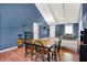 Bright dining room features vaulted ceilings, wood floors and modern decor at 601 Shady Ln, Greenwood, IN 46142
