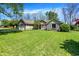 Well-maintained home featuring brick and siding, a two-car garage, and a manicured lawn at 601 Shady Ln, Greenwood, IN 46142