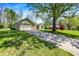 Beautiful single-Gathering home with attached garage, driveway, and a well-kept lawn at 601 Shady Ln, Greenwood, IN 46142