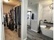 Beautiful bathroom featuring walk-in closet, soaker tub, and neutral color palette at 6360 E Chapel Hill Ct, Camby, IN 46113