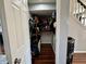 This spacious closet and storage area features lots of organizational shelving and storage at 6360 E Chapel Hill Ct, Camby, IN 46113