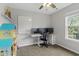 Bright bedroom features a desk and computer setup, perfect for work or study at 7163 Cordova Dr, Indianapolis, IN 46221