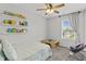 Cozy bedroom featuring a comfortable bed, window, and plenty of natural light at 7163 Cordova Dr, Indianapolis, IN 46221