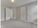Bedroom with two closets and neutral walls at 7202 Red Lake Ct, Indianapolis, IN 46217