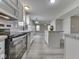 Modern kitchen showcases stone countertops, stainless appliances, and a breakfast bar area at 7202 Red Lake Ct, Indianapolis, IN 46217