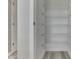 Walk-in pantry with ample storage, including multiple shelving units for organization at 7202 Red Lake Ct, Indianapolis, IN 46217