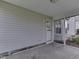 This lovely screened patio offers a relaxing transition space from the exterior to the home at 7202 Red Lake Ct, Indianapolis, IN 46217