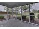 The screened porch overlooks the fenced backyard at 7202 Red Lake Ct, Indianapolis, IN 46217