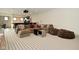 Basement offering a spacious layout with a wet bar, home theater, and comfortable seating at 728 Christin Ct, Plainfield, IN 46168