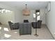 Basement featuring armchairs and a modern light fixture, creating a relaxing atmosphere at 728 Christin Ct, Plainfield, IN 46168
