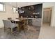 Basement featuring a wet bar with modern shelving and lighting for entertaining guests at 728 Christin Ct, Plainfield, IN 46168