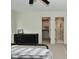 Modern bedroom with large windows, a comfortable bed, and closet and bathroom access at 728 Christin Ct, Plainfield, IN 46168