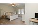 Bedroom featuring a ceiling fan, bed, and a pair of windows that provide natural light at 728 Christin Ct, Plainfield, IN 46168