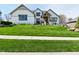Beautiful two-story home with a manicured lawn, stone accents, and a welcoming front porch at 728 Christin Ct, Plainfield, IN 46168