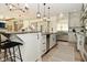 Open concept kitchen with granite island, stainless steel appliances, and access to other rooms at 728 Christin Ct, Plainfield, IN 46168
