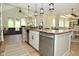 Kitchen featuring a large island, stainless steel appliances, and plenty of natural light at 728 Christin Ct, Plainfield, IN 46168