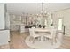 Modern kitchen with stainless steel appliances, a large island, open to the dining area, ideal for entertaining at 728 Christin Ct, Plainfield, IN 46168