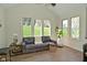 Cozy living room with large windows that give lots of natural light at 728 Christin Ct, Plainfield, IN 46168