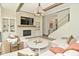 Bright living room with a fireplace, modern staircase, and cozy seating arrangement creates an inviting atmosphere at 728 Christin Ct, Plainfield, IN 46168