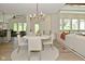Open-concept living space with views of the kitchen, and a comfortable seating area is perfect for gatherings at 728 Christin Ct, Plainfield, IN 46168