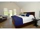Inviting main bedroom with ensuite bath, lots of natural light and beautiful flooring at 728 Christin Ct, Plainfield, IN 46168
