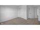 Bedroom features neutral carpet, white walls, and a closet with sliding doors at 7417 Waylon Way, Indianapolis, IN 46239