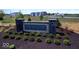 Signage with 'Grayson' nameplate set amidst vibrant landscaping and trees at 7417 Waylon Way, Indianapolis, IN 46239