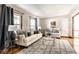 Spacious living room with comfortable seating, natural light, and stylish decor at 7423 Scarborough Blvd E Dr, Indianapolis, IN 46256