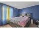 Comfortable bedroom with built-in storage and sunny window at 8031 Edgewood Ct, Plainfield, IN 46168