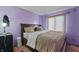 Serene bedroom with soft lighting and comfortable furnishings, perfect for restful nights at 8031 Edgewood Ct, Plainfield, IN 46168
