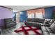 Comfortable living room featuring modern furniture, a window, and stylish décor at 8031 Edgewood Ct, Plainfield, IN 46168