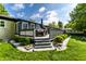 Cozy backyard deck with an outdoor dining set perfect for entertaining and enjoying outdoor relaxation at 845 W 77Th St S Dr, Indianapolis, IN 46260