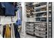Organized walk-in closet features shelves and drawers for ample clothing and accessory storage at 845 W 77Th St S Dr, Indianapolis, IN 46260
