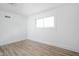 Bright bedroom with light-colored floors and a window providing natural light at 846 W 56Th St, Indianapolis, IN 46228