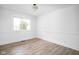 Bright and airy bedroom with wood floors and large windows providing natural light at 846 W 56Th St, Indianapolis, IN 46228