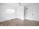 Bedroom featuring a closet, window, and neutral walls and floors at 846 W 56Th St, Indianapolis, IN 46228