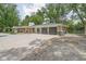 Ranch home featuring attached garage and updated driveway and landscape design at 846 W 56Th St, Indianapolis, IN 46228