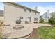 Backyard view with patio and fire pit and ample green space at 9037 Carnation Dr, Noblesville, IN 46060