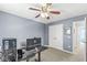Versatile bedroom includes a ceiling fan, neutral carpet, and ample space adaptable for various uses at 9037 Carnation Dr, Noblesville, IN 46060