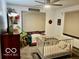 Bedroom showcasing bright natural light, a ceiling fan and playful decor at 908 E 32Nd St, Anderson, IN 46016