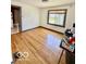 Bright dining room featuring hardwood floors and ample natural light, perfect for Gathering meals at 908 E 32Nd St, Anderson, IN 46016