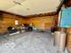 Detached garage interior showcasing storage space and potential for workshop or parking at 908 E 32Nd St, Anderson, IN 46016