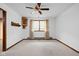 Spacious bedroom with a ceiling fan, carpet, and curtains at 9303 Leroy Rd, Brownsburg, IN 46112