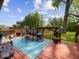 Inviting outdoor deck with comfortable seating, ideal for relaxing and entertaining in a serene setting at 961 N Dellasburg Rd, Columbus, IN 47203