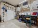 Functional workshop with a workbench, storage shelves, and tool organizers at 961 N Dellasburg Rd, Columbus, IN 47203