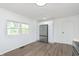 Bright kitchen with white cabinets, stainless steel refrigerator, and ample counter space at 10132 E 33Rd St, Indianapolis, IN 46235