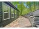 Spacious deck with a scenic view of mature trees and lush landscaping at 10455 Courageous Dr, Indianapolis, IN 46236
