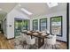 Bright dining area with skylights and a view of the outdoors, perfect for Gathering gatherings at 10455 Courageous Dr, Indianapolis, IN 46236